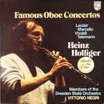 Cover for album: Leclair / Marcello / Vivaldi / Telemann - Heinz Holliger, Members Of The Dresden State Orchestra, Vittorio Negri – Famous Oboe Concertos