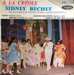 Cover for album: Sidney Bechet Avec Les Orchestres De Claude Luter Et André Réwéliotty – A La Créole(7
