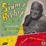 Cover for album: Sidney Bechet  Con  Claude Luter Y Su Orquesta – Pequeña Flor / Blues Del jardin Royal / El Pescadero / Tiger Rag