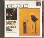 Cover for album: Carter / Varèse - Pierre Boulez, New York Philharmonic, Ensemble InterContemporain – A Symphony Of Three Orchestras / Déserts · Ecuatorial · Hyperprism