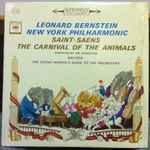 Cover for album: Leonard Bernstein, New York Philharmonic / Saint-Saëns / Britten – The Carnival Of The Animals / The Young Person's Guide To The Orchestra
