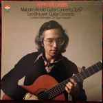 Cover for album: Malcolm Arnold, Leo Brouwer  Performed By John Williams (7), London Sinfonietta – Arnold & Brouwer: Guitar Concerti