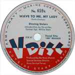 Cover for album: Dinning Sisters / Hoagy Carmichael – Wave To Me, My Lady / Everybody's Seen Him But His Daddy(12