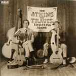 Cover for album: Chet Atkins And Merle Travis – The Atkins-Travis Traveling Show