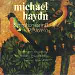 Cover for album: Michael Haydn - Symphony Orchestra of the Oradea Philharmonic conductor : Ervin Acél – Symphonies In B / Pastorello(LP)
