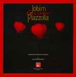 Cover for album: Orquestra de Câmara de Blumenau, Angela Barra – Jobim Piazzolla Encontro