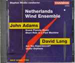 Cover for album: Stephen Mosko, Netherlands Wind Ensemble - John Adams / David Lang – Grand Pianola Music / Short Ride In A Fast Machine / Are You Experienced? / Under Orpheus