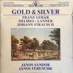 Cover for album: Franz Lehár, Léo Delibes, Joseph Lanner, Johann Strauss II, Budapest Philharmonic Orchestra, Janos Sandor, Hungarian State Orchestra, János Ferencsik – Gold And Silver(CD, Album, Remastered, Stereo)