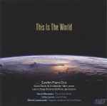Cover for album: CanAm Piano Duo, David Maslanka, Libby Larsen, Witold Lutoslawski – This Is The World(CD, )