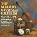 Cover for album: Béla Fleck, Zakir Hussain, Edgar Meyer & Detroit Symphony Orchestra - Leonard Slatkin – The Melody Of Rhythm (Triple Concerto & Music For Trio)