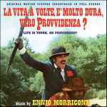 Cover for album: La Vita A Volte È Molto Dura, Vero Provvidenza? (Life Is Tough, Eh Providence?) (Original Motion Picture Soundtrack In Full Stereo)
