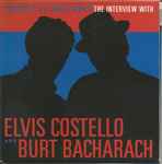 Cover for album: Elvis Costello And Burt Bacharach – Because It's A Lonely World (The Interview With)(CD, Promo)