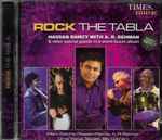 Cover for album: Hossam Ramzy Featuring A.R. Rahman, Billy Cobham, Manu Katché, Omar Faruk Tekbilek – Rock The Tabla